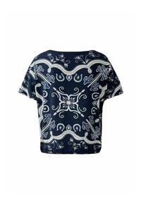Blouse marine avec un riche broderie blanche en paisley et en fleurs, manches courtes et coupe décontractée, présentant des motifs complexes sur toute sa surface.