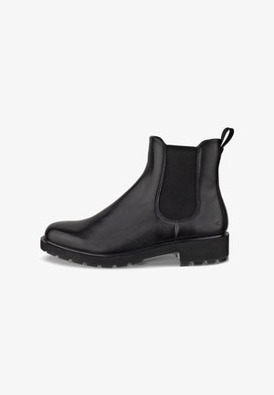 Botas Chelsea de couro preto com painéis laterais elásticos, bico arredondado, sola de borracha grossa e puxador na parte traseira para fácil calçar.