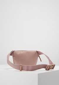 Herschel Sac banane - pink