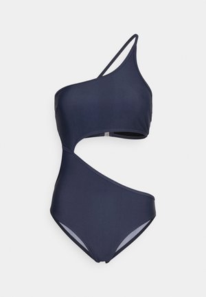 Mørkeblå en-skulder badedragt med udskæringsdesign, glat tekstur, minimal syning og en strømlinet silhuet.