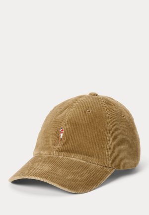 Gorra de béisbol de pana marrón con pequeño logo bordado de una persona sosteniendo un palo de polo en el panel frontal.