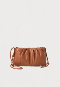 Brown leather clutch bag with pleated design, adjustable strap, and rounded edges. Smooth texture with a subtle gloss finish.