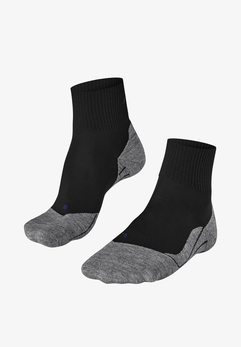 Calzini neri alla caviglia con tallone e punta grigi, caratterizzati da un orlo a coste e una superficie liscia. Accentuati da piccoli dettagli di branding blu.