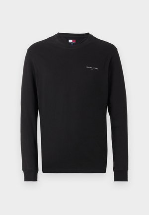 Zwart lange mouwen T-shirt van katoen, met een ronde hals en een klein wit logo op de linkerkant van de borst, voorzien van geribbelde boorden.