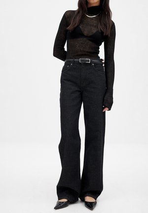 Jeans a zampa - black