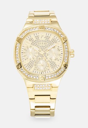 Montre en or avec un grand cadran rond, accents en cristal, cadran texturé et trois sous-cadrans, avec un bracelet de style à maillons.