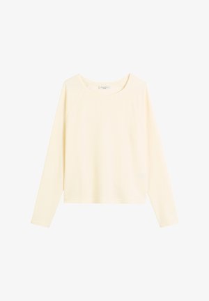 T-shirt à manches longues et col rond en tissu crème clair doux. Présente une coupe décontractée et des manches raglan avec une texture lisse.