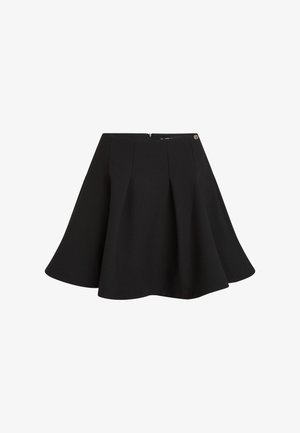 Musta laskostettu hame, jossa levenevä malli ja sileä kangas. Takana piilotettu vetoketju ja pieni logokoriste.