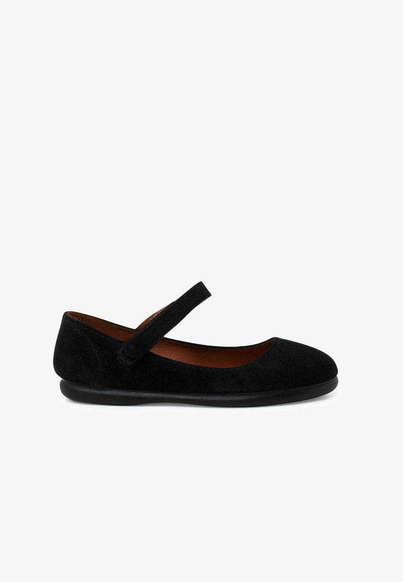Black suede Mary Jane flat shoes with a rounded toe, adjustable strap, and a smooth rubber sole. Textured upper adds subtle detail.