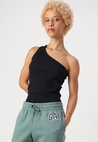 GAP Petite HERITAGE - Spodnji deli trenirk - district green