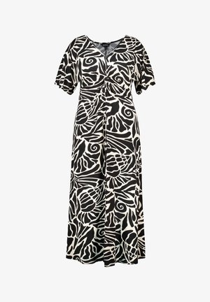 Robe maxi noire et blanche avec un motif floral abstrait, présentant des manches courtes, un décolleté en V et un design à l'avant tordu.