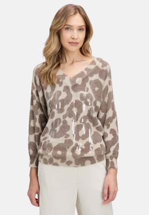 - Sweter