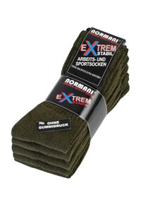 Grüne Baumwollsocken gestapelt, mit einem Etikett, auf dem "EXTREM STABIL" und "OHNE GUMMIDRUCK" steht, was auf keinen Gummidruck hinweist.