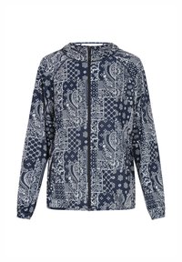 Giacca zip-up navy con un motivo paisley e geometrico in bianco, dotata di maniche lunghe e cappuccio. Realizzata in tessuto leggero.