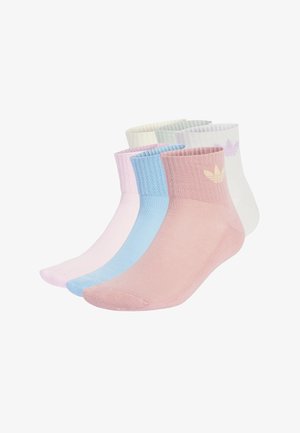 Four pairs of ankle socks in pink, blue, green, and white, featuring ribbed cuffs and subtle brand logos on the sides.
