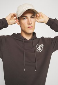 Études Sudadera - dark brown