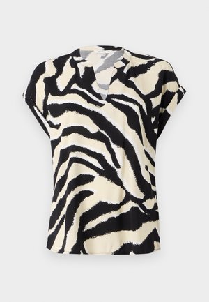 Kortermet topp i lett stoff med et svart og kremfarget zebra mønster, med en subtil V-hals og løs passform.