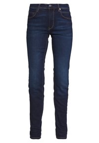 Tajta jeans i mörk denim med en jämn textur, med kontrasterande guldstygn, en framficka och en klassisk knappstängning.