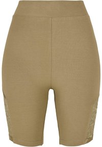 Bruine knielange shorts van rekbaar materiaal, met kanten zijkanten voor extra detail en textuur. Glad oppervlak overal.
