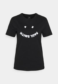 Černé bavlněné tričko s kulatým výstřihem. Na přední straně se nachází tučný bílý nápis "PAUL SMITH" v hravém designu. Krátké rukávy.