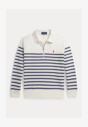 Pullover met lange mouwen en rits in crème met marineblauwe horizontale strepen. Voorzien van een geribbelde kraag en een klein rood logo op de borst. Zacht van textuur.