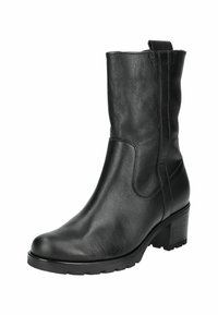 Bottine en cuir noir avec un bout arrondi, tige texturée et talon empilé. Comprend des panneaux élastiques sur les côtés et une languette à l'arrière.