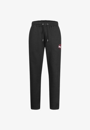 Pantaloni da jogging neri con vita elastica, coulisse regolabile e un piccolo logo rosso sulla coscia sinistra. Tessuto liscio e vestibilità affusolata.