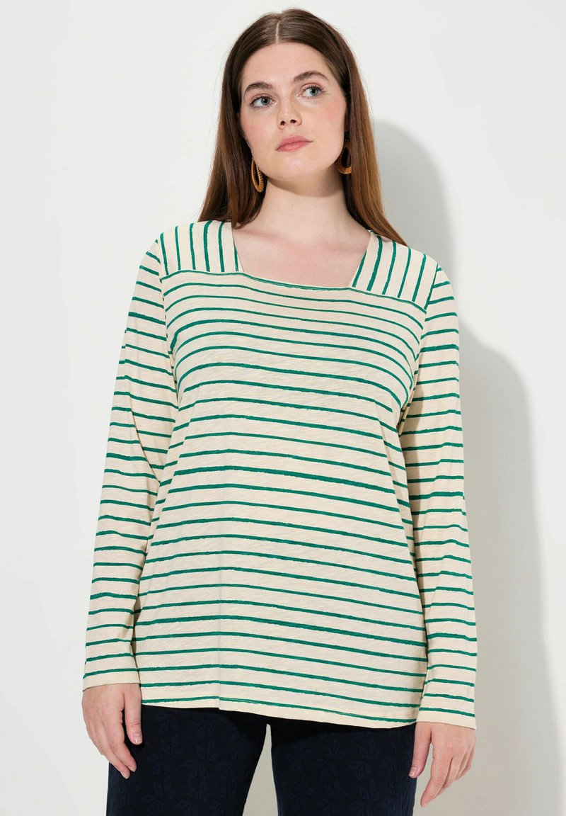 Gestreiftes Langarmshirt in Creme und Grün. Hat einen quadratischen Ausschnitt und eine lockere Passform, gefertigt aus weichem, strukturiertem Stoff.