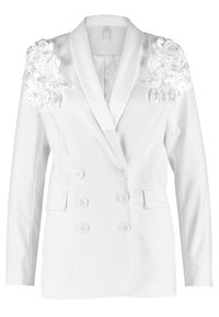 Biała dwurzędowa marynarka o satynowym wykończeniu, z kwiatowymi zdobieniami na ramionach, klapami i bocznymi kieszeniami.