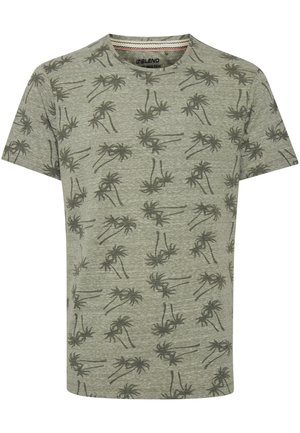 Vihreä t-paita lyhyillä hihoilla, jossa on tummemmasta vihreästä palmupuun kuviosta koostuva toistuva kuvio teksturoidulla, heather-kankaalla.