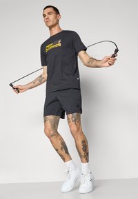 New Balance GRAPHIC  - Sportfelső - black