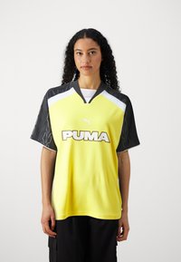 Puma FOOTBALL UNISEX - Camiseta estampada - yellow/black