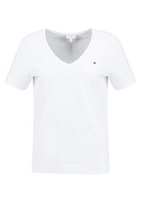 Camiseta blanca de algodón con escote en V y mangas cortas. Presenta un sutil y pequeño logo en la zona del pecho izquierdo. Ajuste clásico y textura suave.