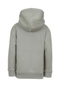 Grå huvtröja med en slät yta, ribbade ärmslut och nederkant samt en sömlös bakdesign. Har en rundad huva.