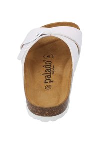 Weiße Slip-On-Sandale mit breitem Riemen, Korkfußbett und strukturiertem braunen Innenfutter. Mit runder Zehenpartie und glatter Oberflächenbeschaffenheit.