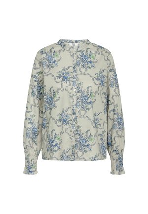 Light green shirt featuring blue floral patterns with green accents, button front, and long puffed sleeves with elastic cuffs.