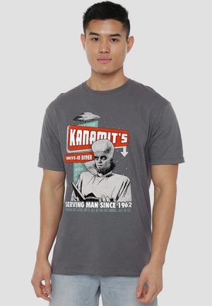 Gray cotton t-shirt featuring a retro alien graphic with text, round neckline, and short sleeves, highlighting diner theme and humor.