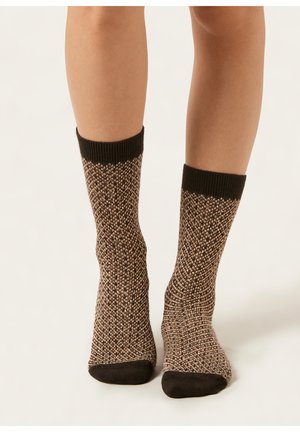 Knit brown and black socks with a textured pattern, featuring a black ribbed cuff and solid black toe and heel accents.