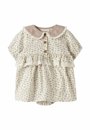 Krémové dojčenské šaty s malým hnedým kvetinovým vzorom, volánikovým čipkovaným lemom, drevenými gombíkmi a béžovým golierom Peter Pan s čipkovým okrajom.