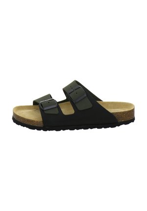 Black slide sandal with two adjustable buckled straps, cork footbed, and textured black rubber sole.