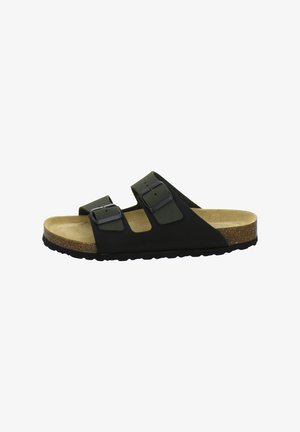 Black slide sandal with two adjustable buckled straps, cork footbed, and textured black rubber sole.
