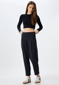 Koton MODAL - Pantalones - black
