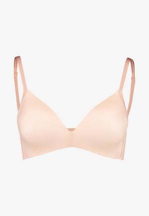 Sutien ligeiramente acolchoado, sem costuras, em material bege suave com alças ajustáveis e decote em V. Textura suave, design minimalista.