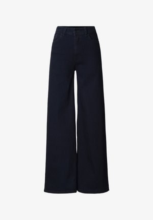 Vidtsiddende mørkeblå jeans lavet af denim med højtaljet pasform, to forlommer og en ren, afsyet kant ved benene.