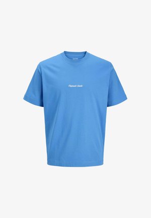 Sinine puuvillane T-särk, millel on mugav lõige, ümmargune kaelus ja lühikesed varrukad. Rinnal on väike valge kiri "Original Studio".