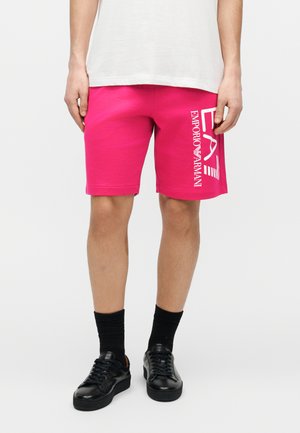 TRAIN CORE BIG LOGO - Spodnji deli trenirk - fucsia