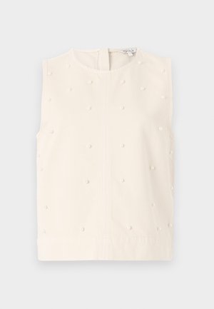 Sleeveless cream top with a round neckline, textured fabric, embellished with small round pearl accents. Features a back zipper closure.