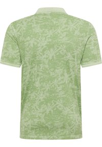 Kurzärmliges Polo-Shirt in Hellgrün mit einem subtilen Blattmuster, ausgestattet mit einem gerippten Kragen und Bündchen in einem etwas helleren Farbton.