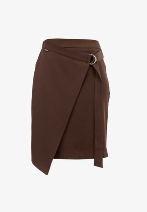 Brown wrap skirt with a ring buckle detail, made from smooth fabric. Features a side tie and asymmetrical hem for a modern silhouette.