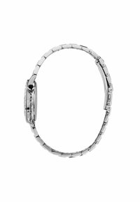 Zilveren metalen polshorloge met een schakelarmband, ronde kast, zwarte kroon en kleine versieringen op de bezel.